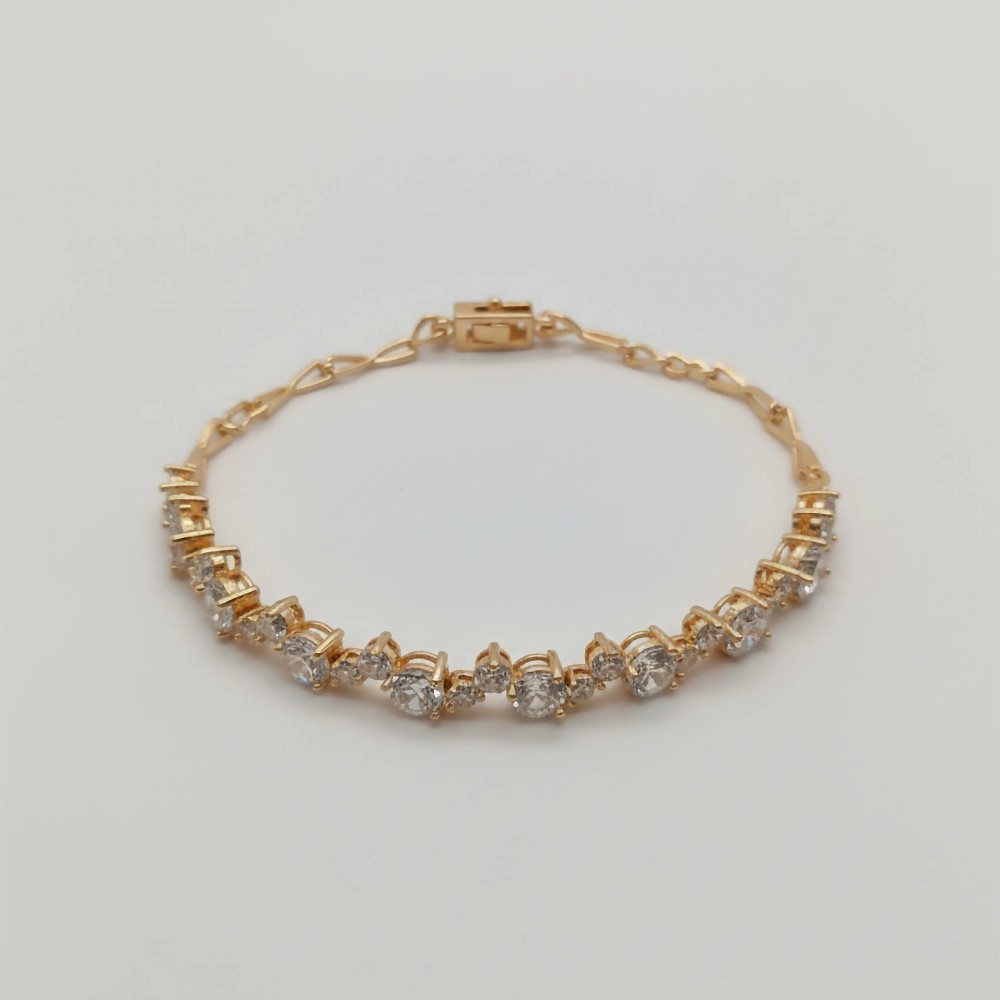 Złota bransoletka z cyrkoniami – rose gold, ogniw